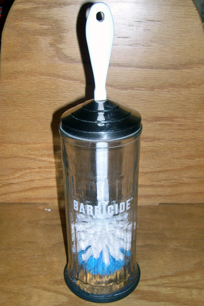 Complete self-disinfecting toilet brush before adding disinfectant.